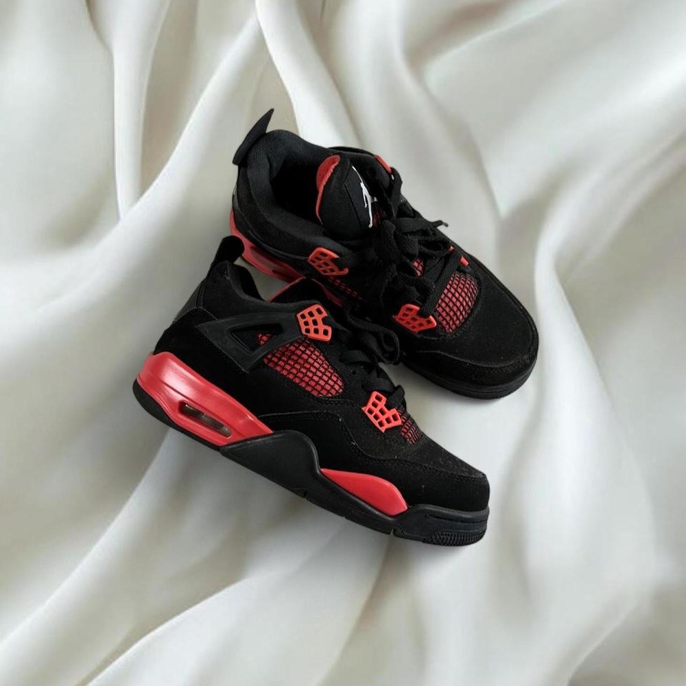 Nike Air Jordan 4 Retro sneakers Red Thunder colorway athletic sneakers